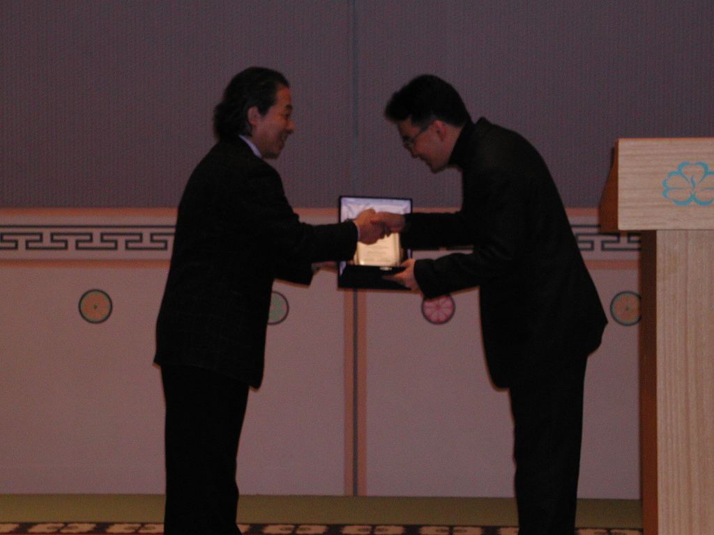 2003_02_00_received the Best Paper Award in the ICOIN-2003.jpg